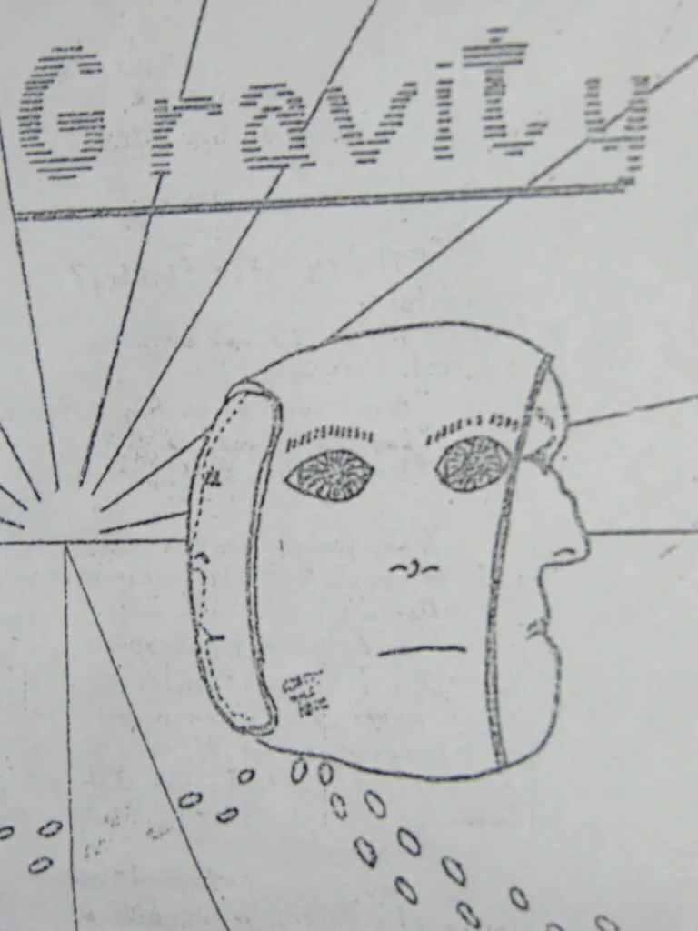 A head with 3 faces on a road at sunset, or is it sunrise? Drawing